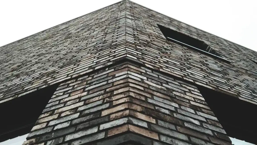 painting black brick facade
