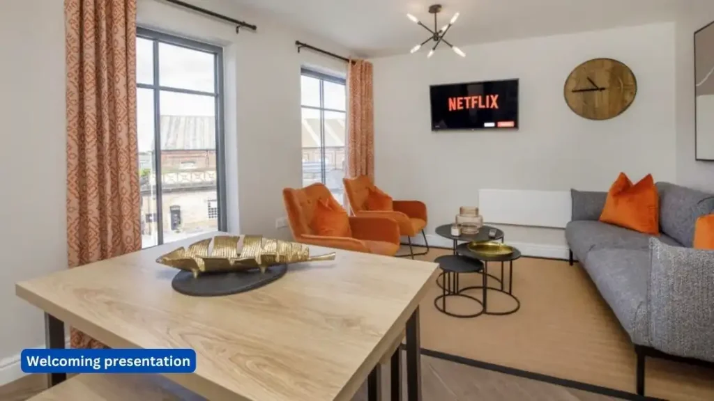 Tips for becoming a first time landlord: A living room with a table and chairs and a tv.