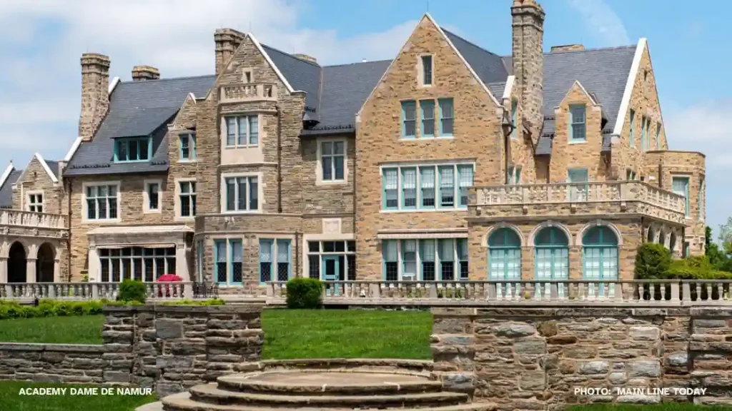 A unique stone mansion with steps leading up to it in the desirable Academy Dame De Namur near Villanova