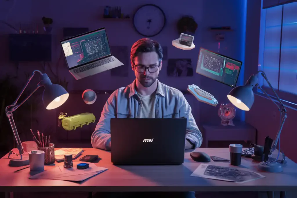 A person using an MSI laptop sits at a desk with two floating laptops, a floating monitor, and various gadgets surrounding them. The scene, reminiscent of a high-tech pre-construction planning setup, is illuminated with vibrant blue and purple lighting.