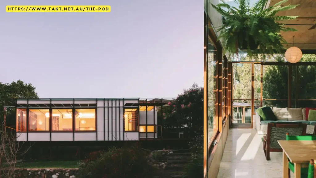 Modern house with large windows, lit interiors, and a thoughtfully constructed sunlit hallway featuring plants.