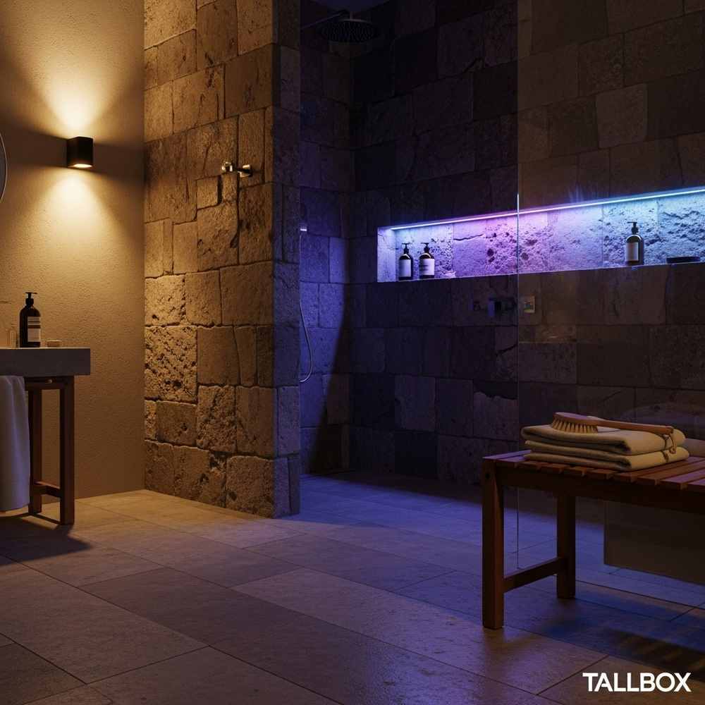 Modern stone-tiled spa bathroom design featuring a glass shower, purple LED shelf lighting, and folded towels neatly arranged on a bench.